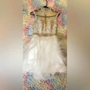 Mori Lee White sequins short prom dress. Gold accents. Zip back. Size 4.